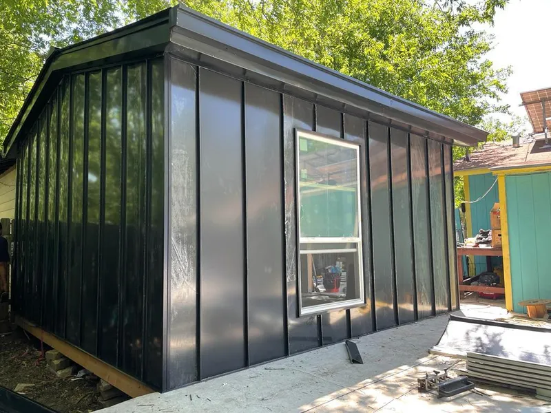 Black standing seam metal wall panels for Roof Inspection in Jerome