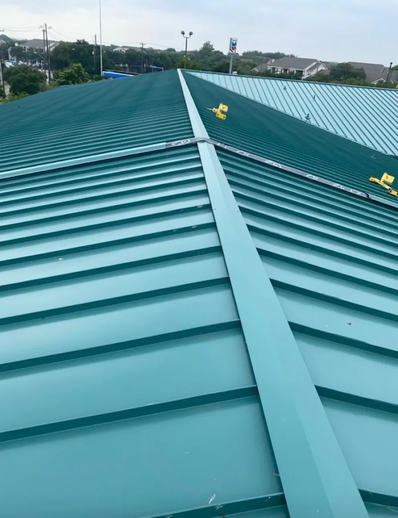 Green commercial metal roof ridge and valley for Metal Roof Repair in Jerome