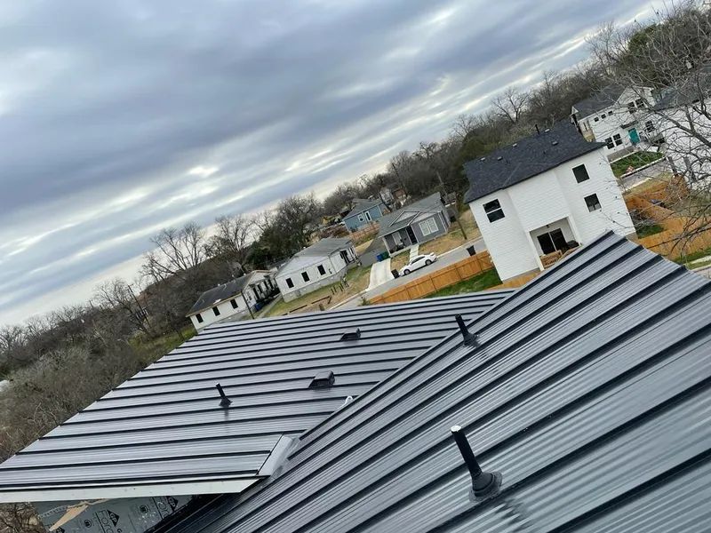 Standing seam metal roof panels with vents for Skylight Repair in Jerome